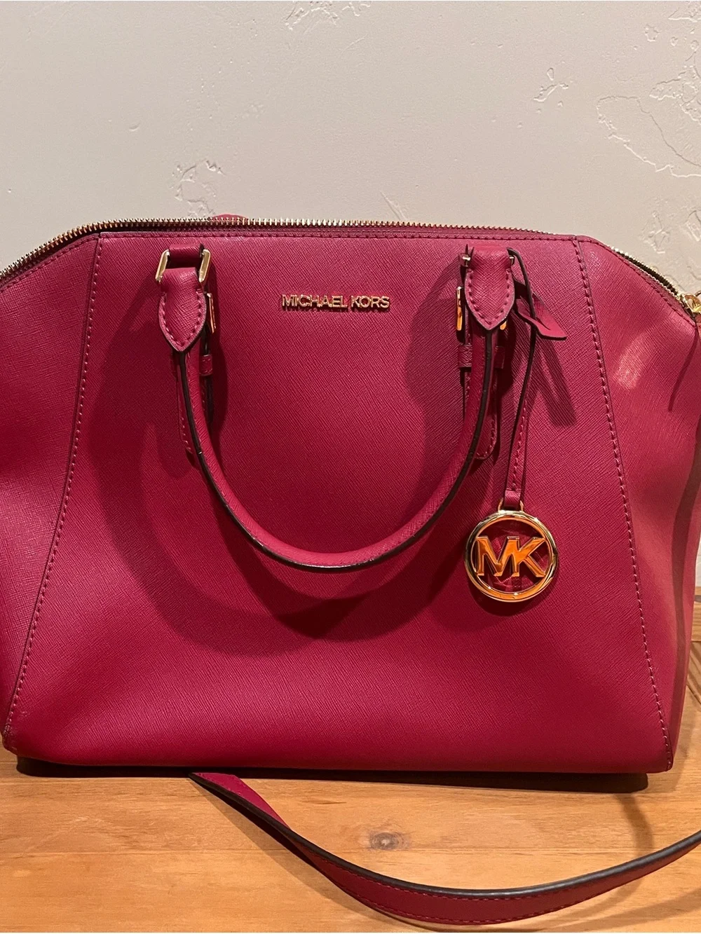 Michael Kors Fuchsia Saffiano Leather Satchel with Gold Charm.